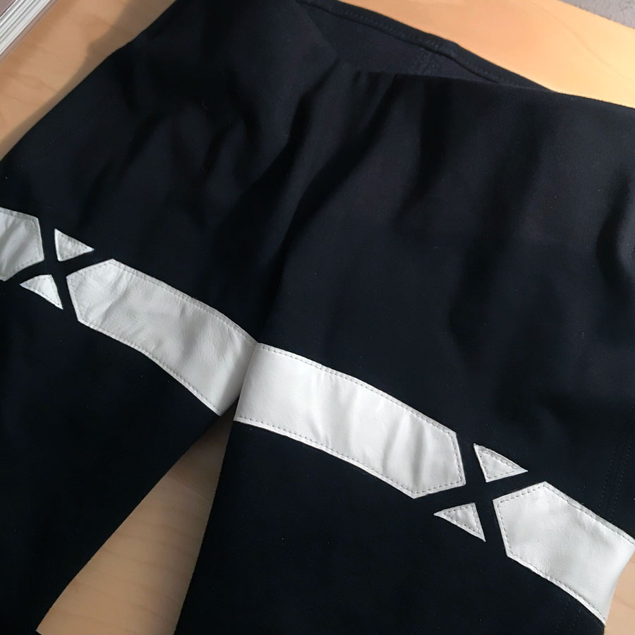 Knit pants with leather applique detail